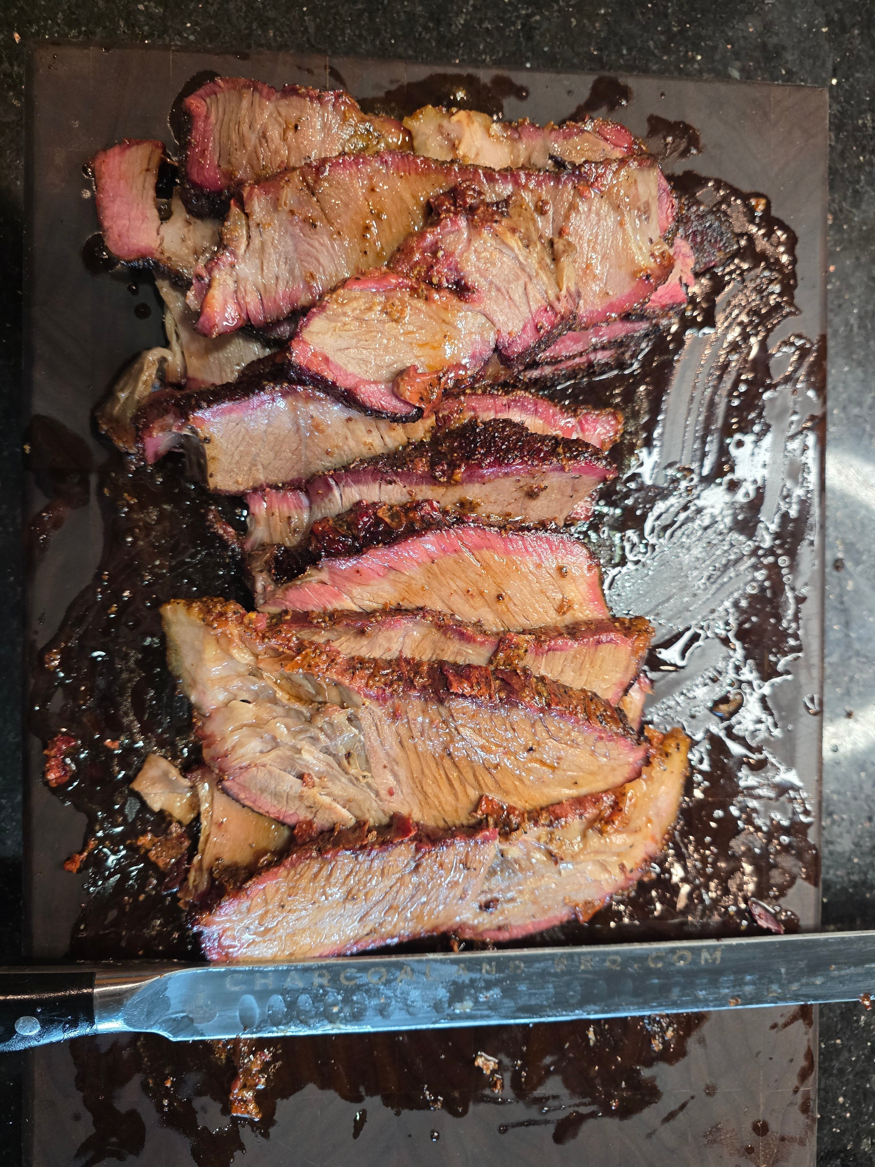 Smoked Chuck Roast with Slicing Knife on Walnut cutting board