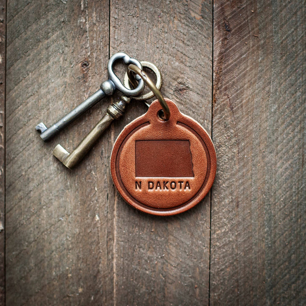 North Dakota State Silhouette Leather Keychain Circle