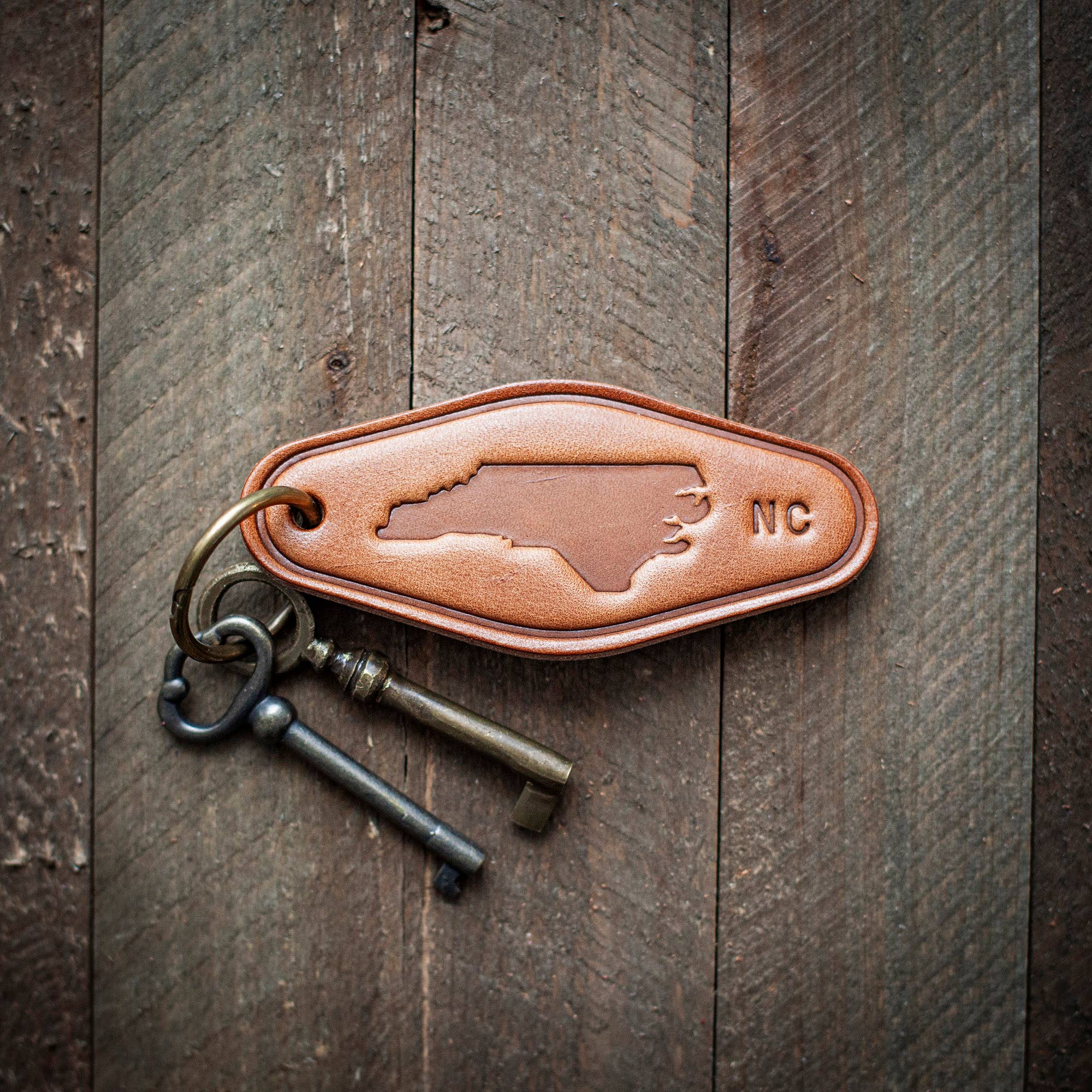 North Carolina State Silhouette Leather Keychain Motel Style