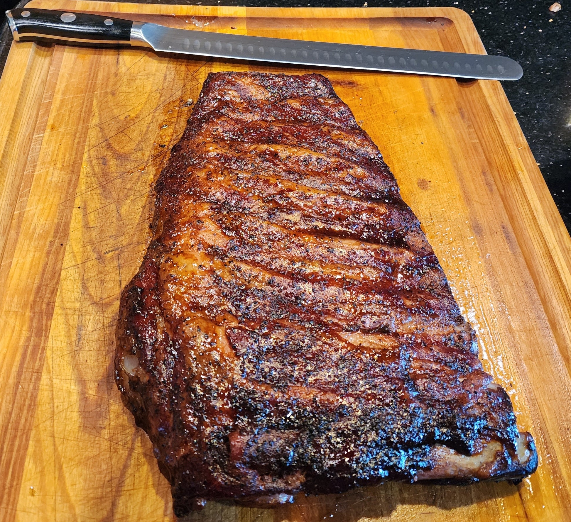 Ribs image with a 12" hill country brisket knife