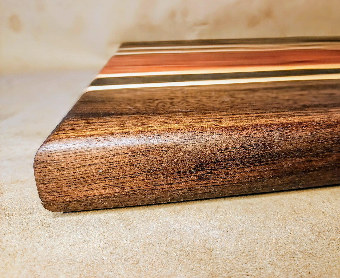 Padauk, walnut, maple and wenge cutting board