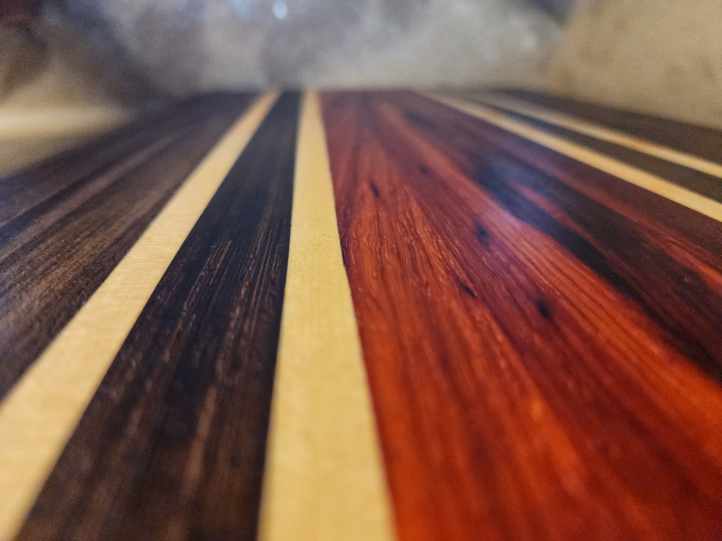 Padauk, walnut, maple and wenge cutting board